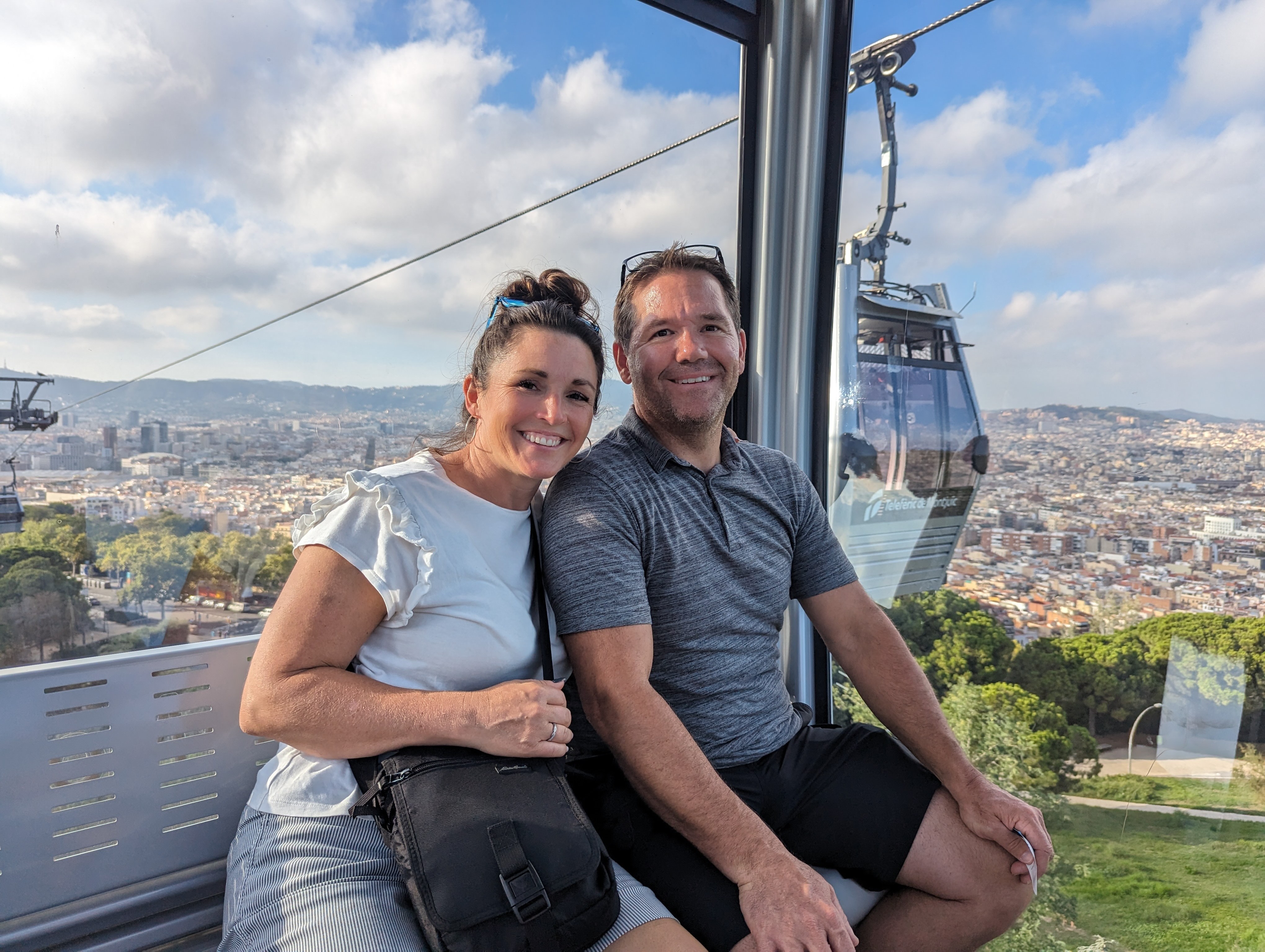 Jared and Nicole enjoying a cable car ride together